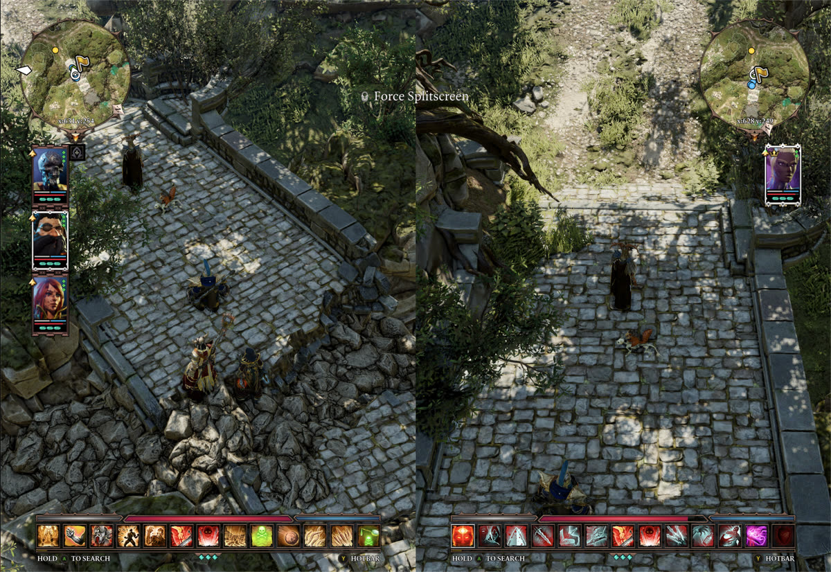Split screen on a stone bridge, the party split between the two players