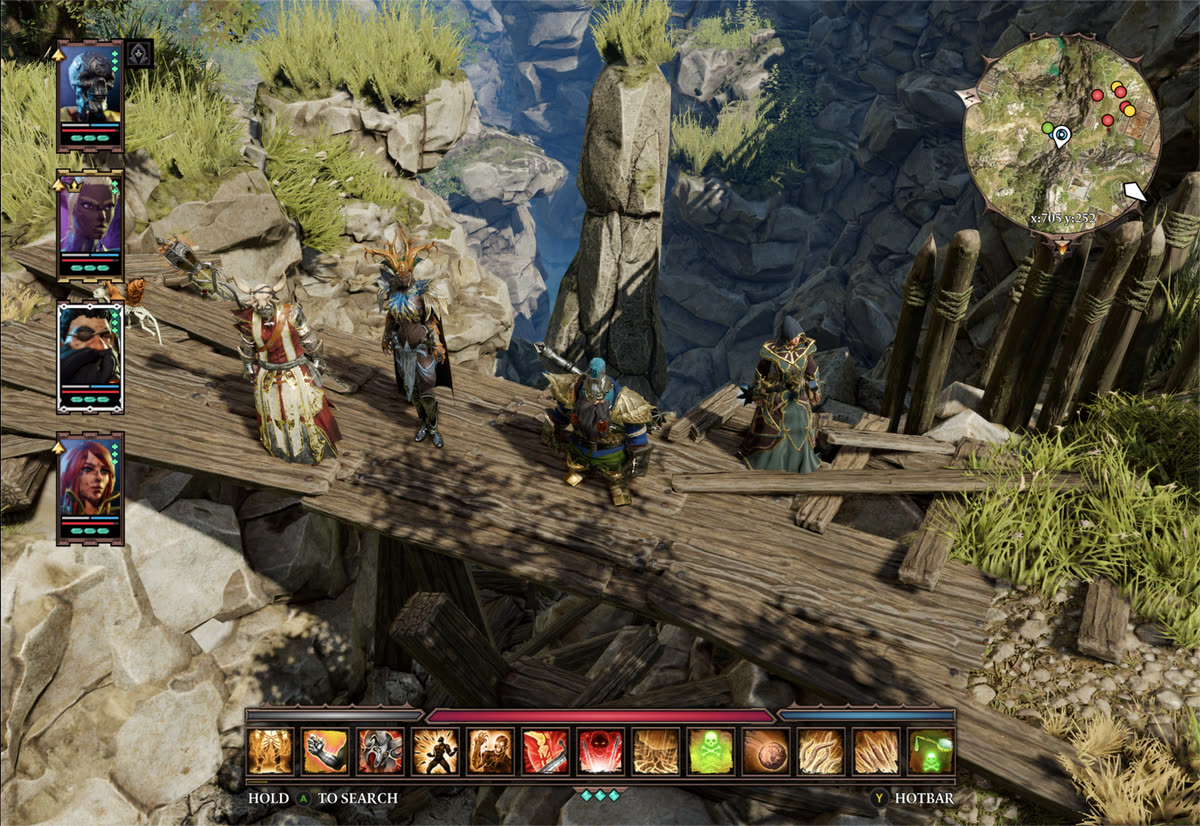The whole party of four back together on a wooden bridge