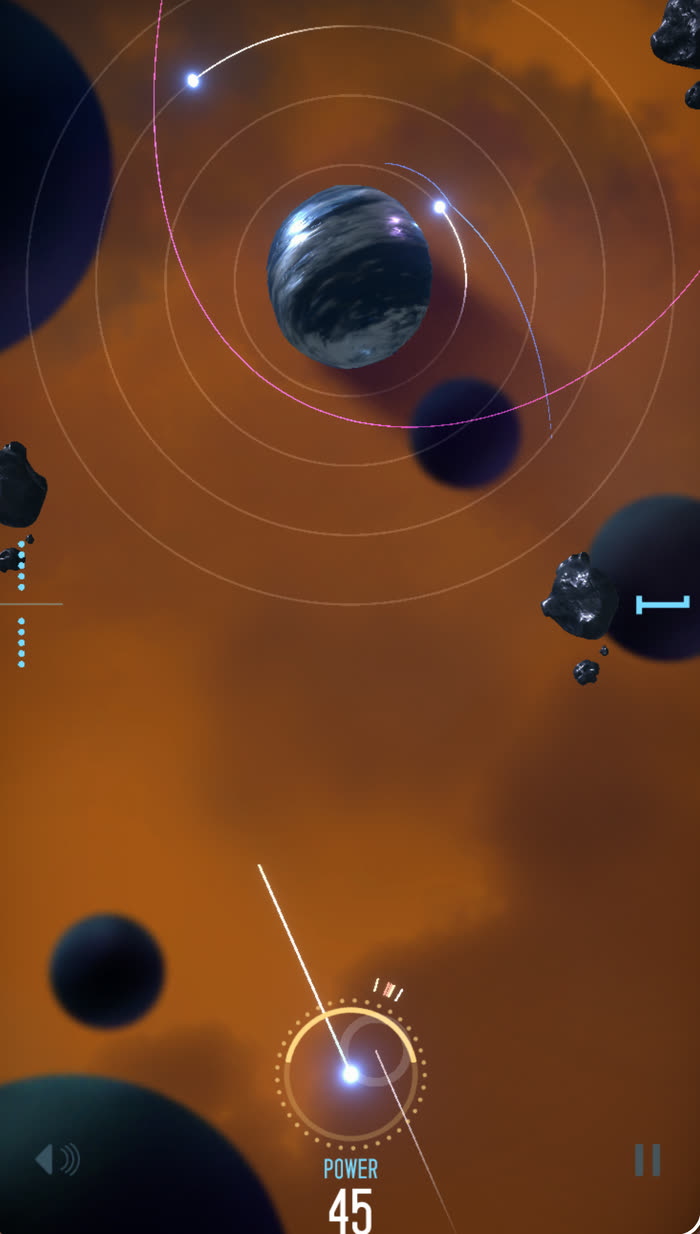 Orbit Arcadia: aiming a launch with the power meter at 45, a planet with orbiting moons at the top