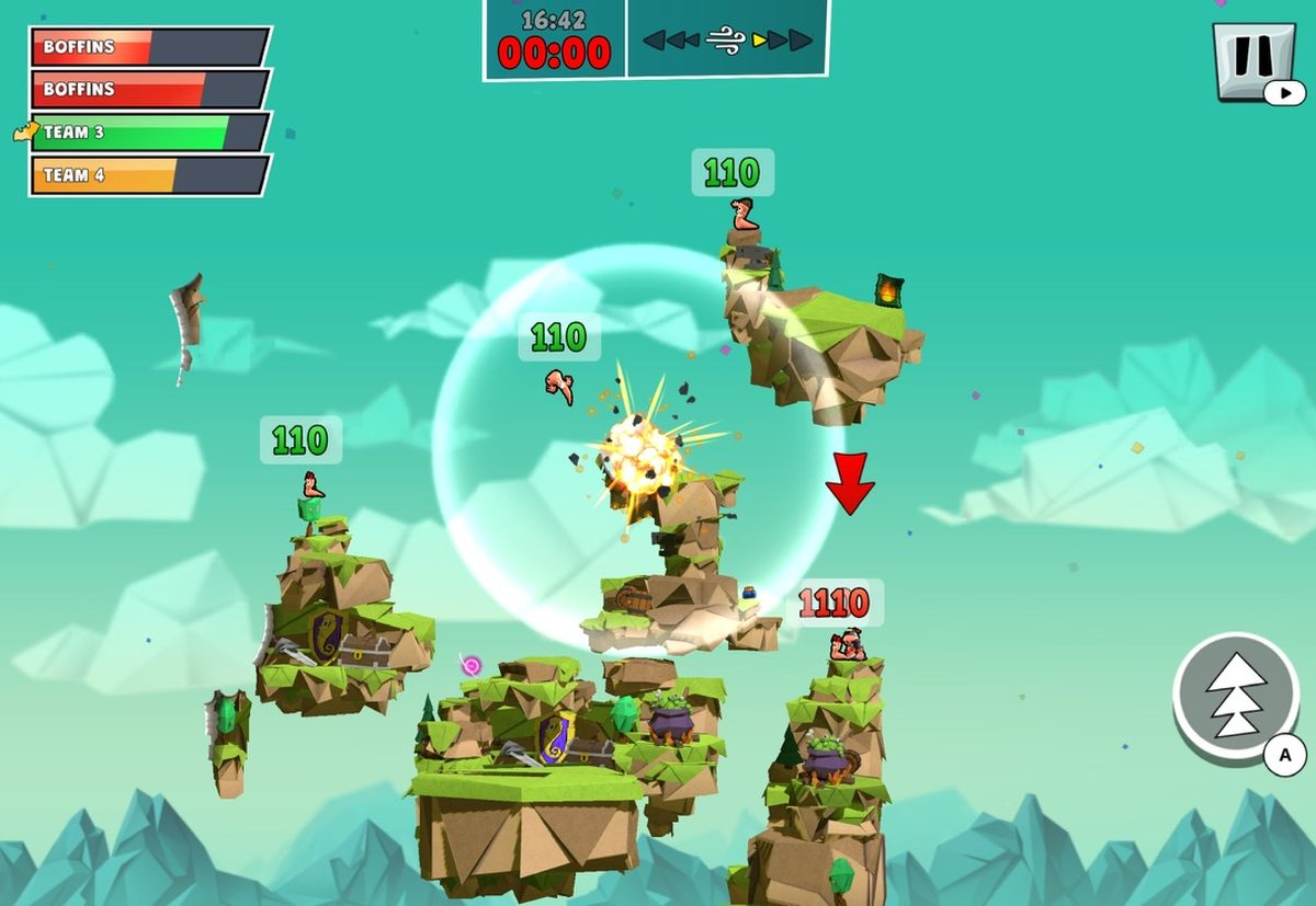 Worms Across Worlds on floating grass islands, a bazooka shot exploding mid-map while two teams aim from opposite ledges