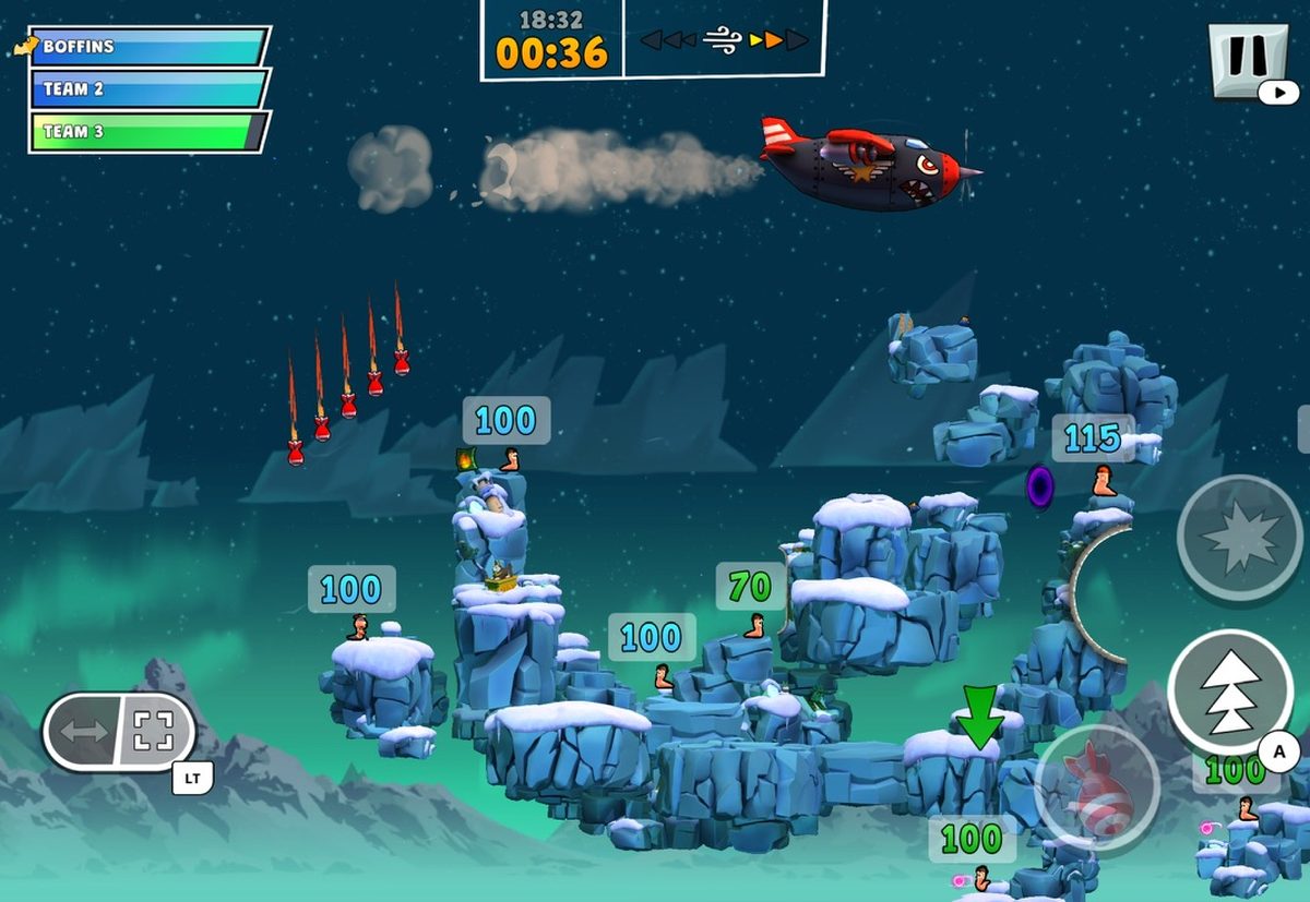 Air strike over an ice level at night, a bomber dropping missiles on snow-covered blocks while worms wait for their turn